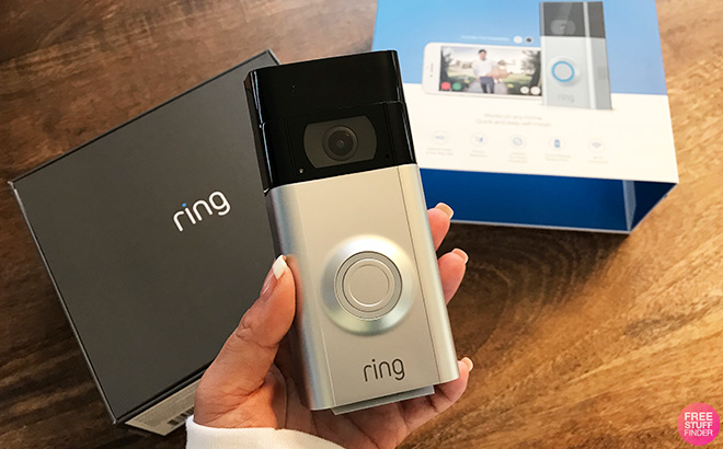 A Person Holding Ring Battery Gen 2 Doorbell