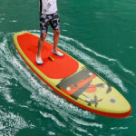 A Person Using a Paddle Board