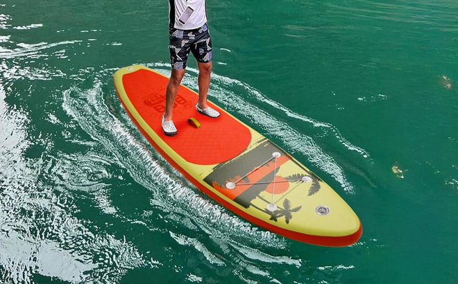 A Person Using a Paddle Board