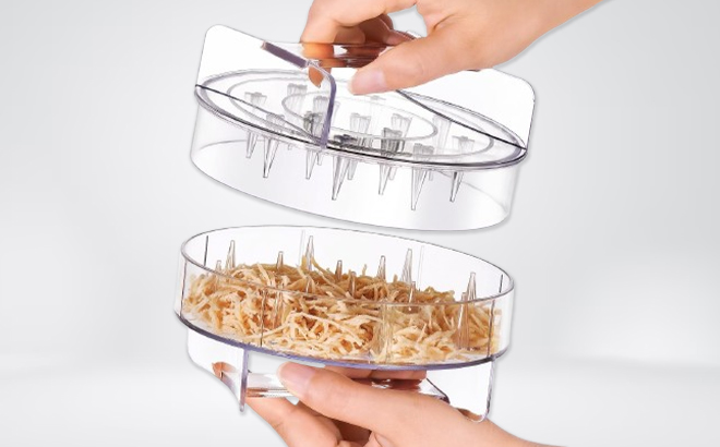 A Person Using the Manba Chicken Shredder Tool