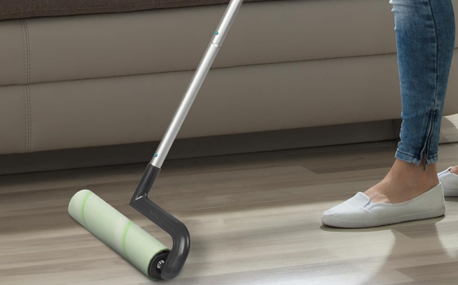 A Woman Using the Smart Design Large Mega Floor Lint Roller