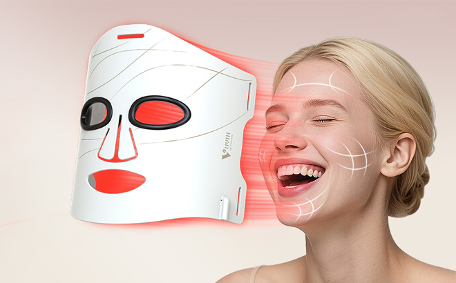 A Woman Using the VYM Red Light Therapy for Face