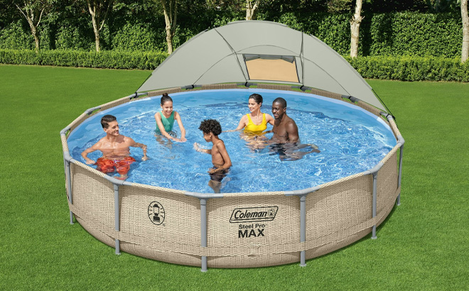 Coleman Steel Pro Max Round Metal Frame Above Ground Pool Set on the Grass Coleman Steel Pro Max Round Metal Frame Above Ground Pool Set on the Grass
