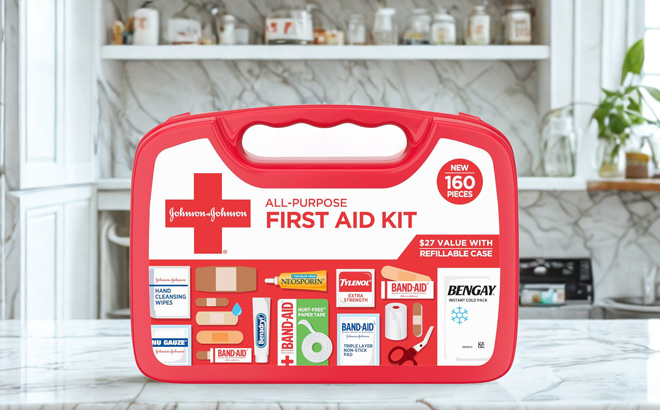 Johnson Johnson All Purpose Portable Compact First Aid Kit on a Table