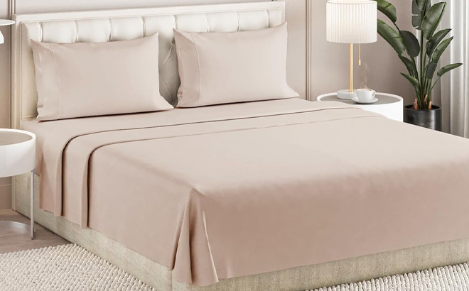 Sleepy Town 4 Piece Queen Sheet Set in Wheat Color on a Bed