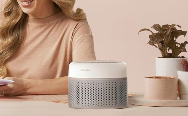 A Bionaire Elements Desktop 360 Air Purifier on a Desk