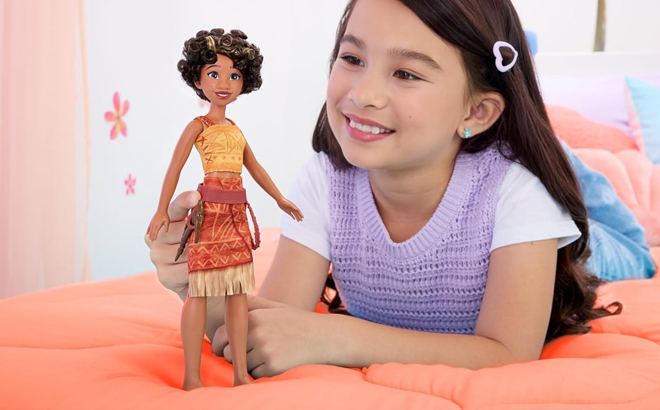 A Girl Playing with the Disney Moana Loto Doll
