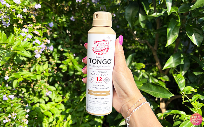 A Person Holding Tongo Insect Spray A Person Holding Tongo Insect Spray