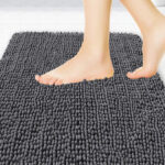 A Person Standing on Bathroom Rug