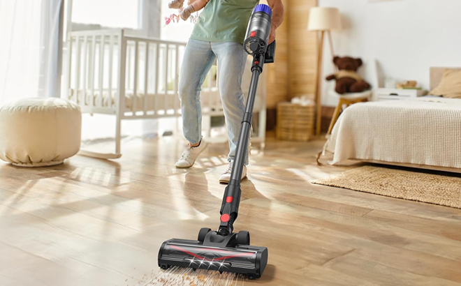 A Person using a Teendow Cordless Vacuum Cleaner
