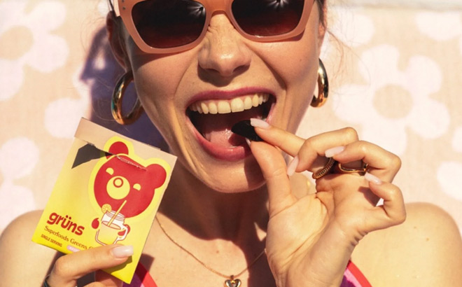 A Woman Eating Raspberry Lemonade Gruns Gummies