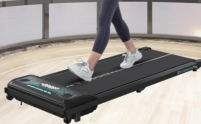 A Woman Using the CITYSPORTS Under Desk Treadmill A Woman Using the CITYSPORTS Under Desk Treadmill