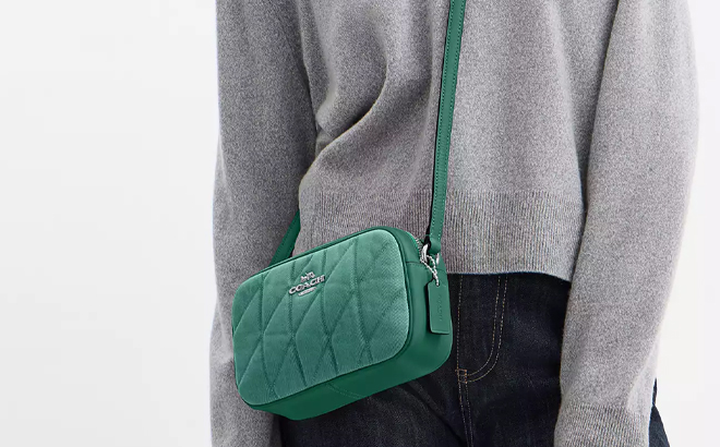 A Woman Wearing Coach Outlet Mini Jamie Camera Bag A Woman Wearing Coach Outlet Mini Jamie Camera Bag