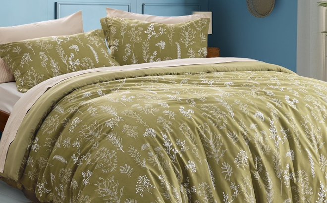 Cozy Comfort 3 Piece King Comforter Set in Olive Green Color on a Bed