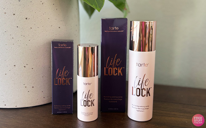Two Tarte Setting Sprays on a Tabletop Two Tarte Setting Sprays on a Tabletop