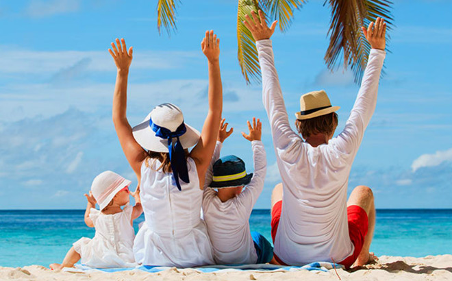 A Family On a Beach Having Fun