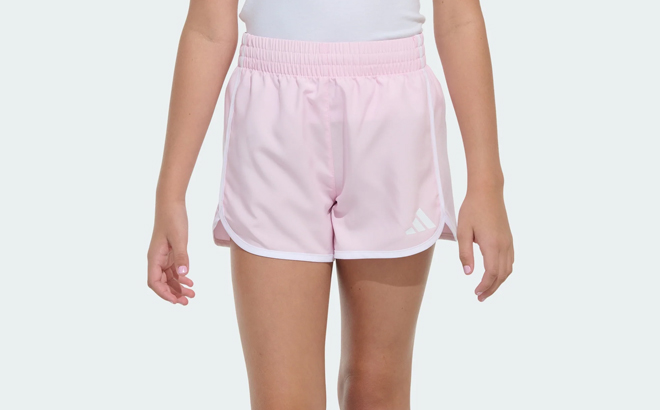A Girl Wearing Adidas Elastic Waistband Woven Shorts with Binding