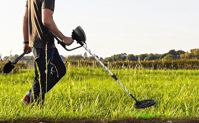A Man Using the GOOROLF Metal Detector