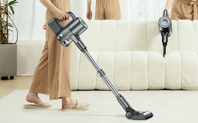 A Person Cleaning a Carpet Using VersLife Cordless Vacuum Cleaner