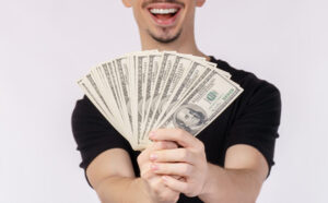 A Person Holding Cash