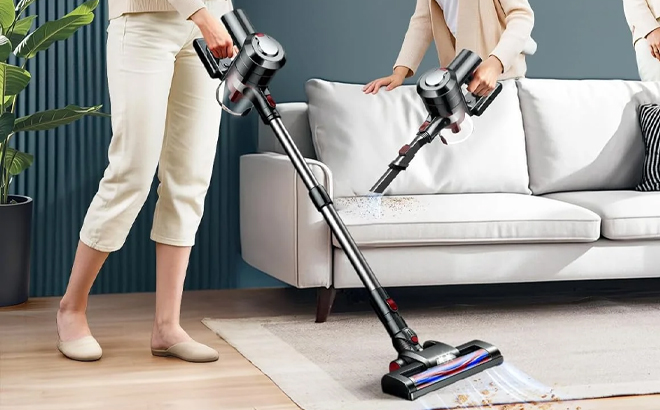 A Person Using the Kuose Cordless Vacuum Cleaner