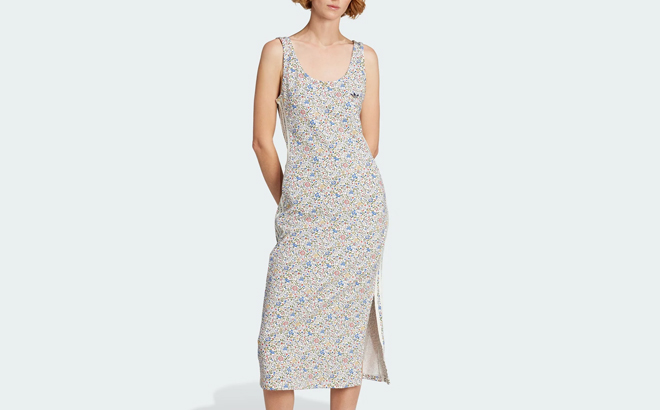 A Woman Wearing Adidas Originals x Liberty London Bodycon 3 Stripes Maxi Dress A Woman Wearing Adidas Originals x Liberty London Bodycon 3 Stripes Maxi Dress