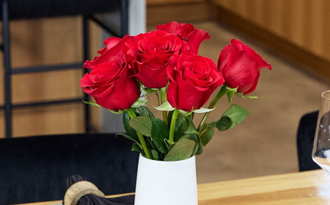 Fresh Roses Mini Bouquet in a Vase on a Table