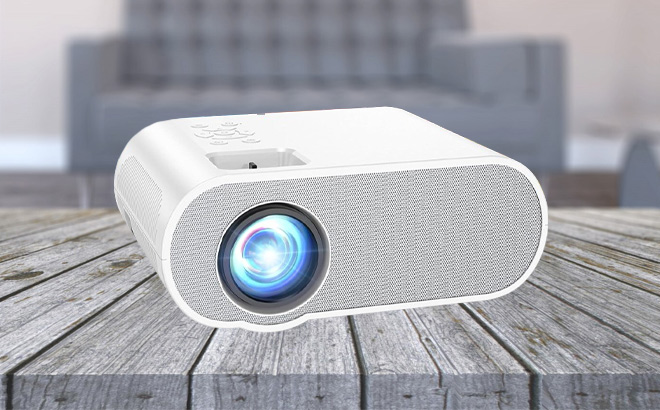 Native 1080P Full HD Bluetooth Projector on the Table