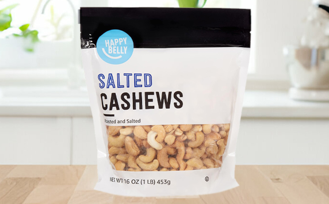 A Bag of Happy Belly Roasted and Salted Cashews on a Table