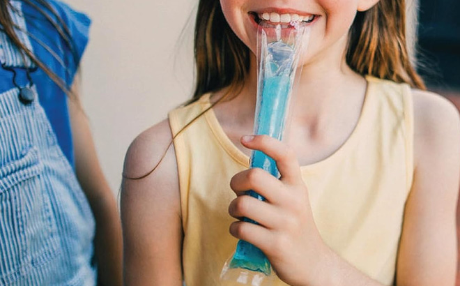 A Kid Holding Wylers Italian Ice Freezer Bar A Kid Holding Wylers Italian Ice Freezer Bar