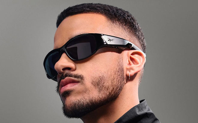 A Man Wearing Reebok Nitrous Smart Audio Sunglasses A Man Wearing Reebok Nitrous Smart Audio Sunglasses