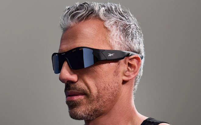 A Man Wearing Reebok Octane Smart Audio Sunglasses