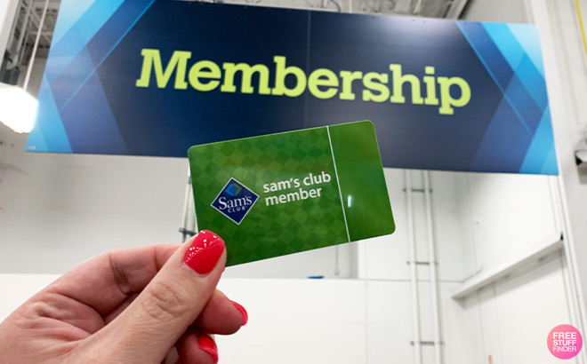 A Person Holding Sams Club Card