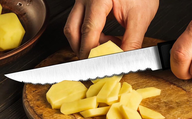 A Person Holding Steak Knife