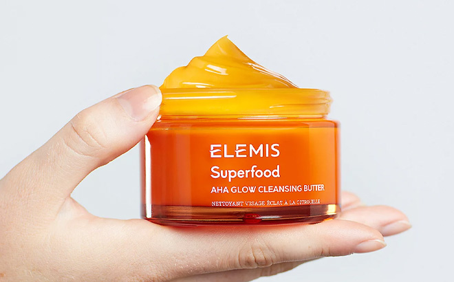A Person Holding Superfood AHA Glow Cleansing Butter