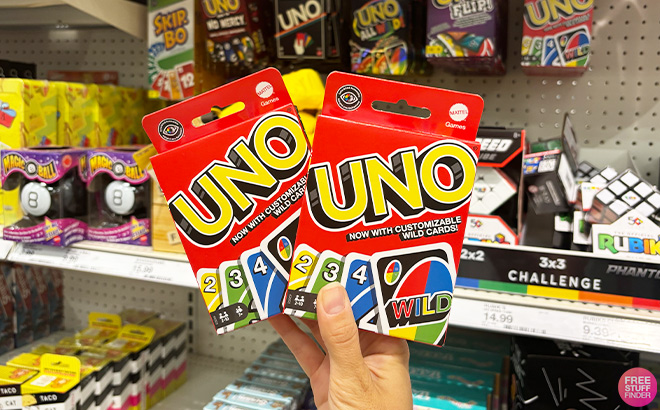 A Person Holding UNO Card Games