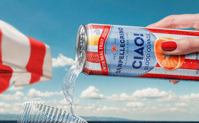 A Person Pouring San Pellegrino Sparkling Water