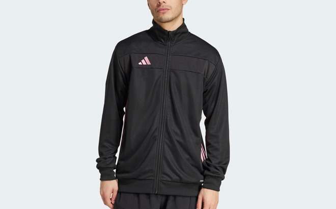 A Person Wearing Adidas Mens Tiro 25 Essentials Training Jacket