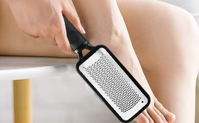 A Person using a Fu Store Stainless Steel Foot File