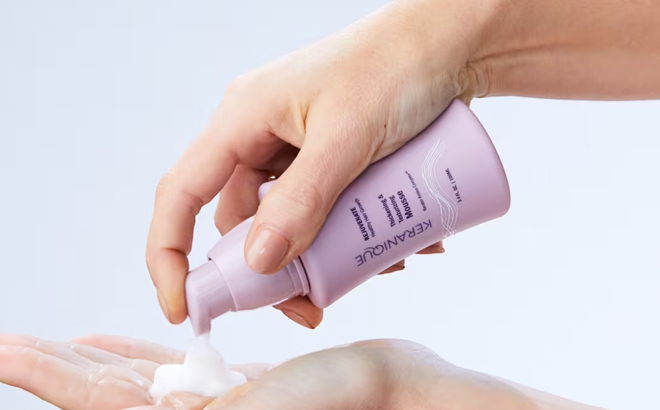 A Woman Using the Keranique Thickening and Texturizing Mousse