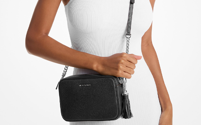 A Woman Wearing Michael Kors Ginny Leather Crossbody Bag
