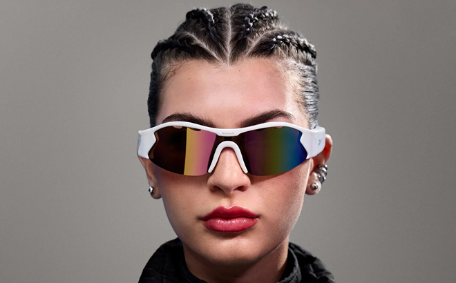 A Woman Wearing Reebok Flash Smart Audio Sunglasses