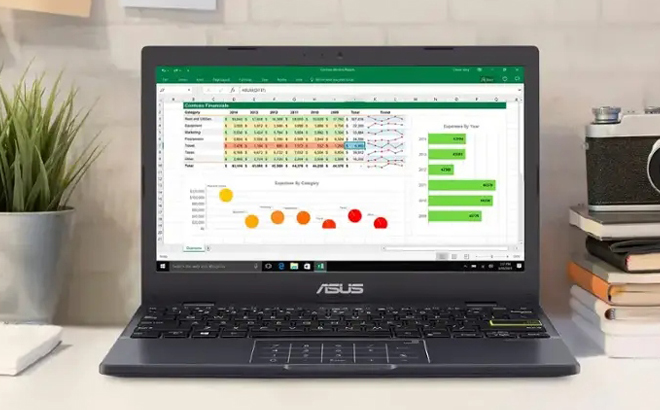 ASUS Vivobook Go 14 Inch Laptop on a Desk