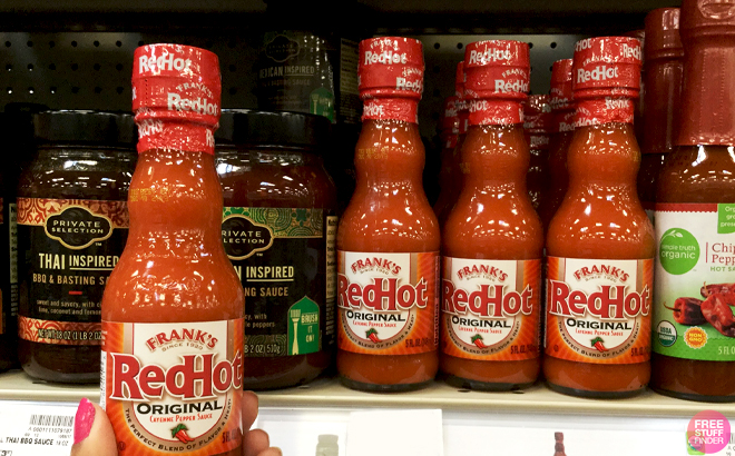 Franks RedHot Hot Sauce 5 Ounce Bottles on a Store Shelf Franks RedHot Hot Sauce 5 Ounce Bottles on a Store Shelf