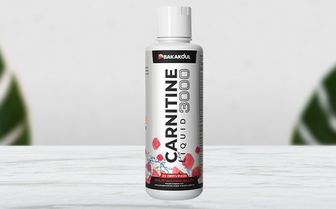 L Carnitine Supplement Liquid on the Table
