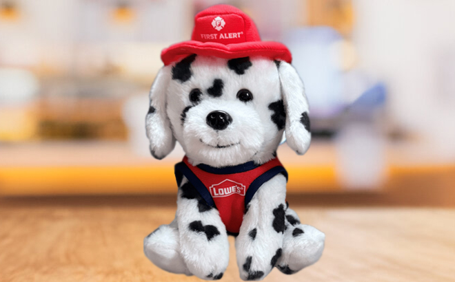 Lowes x First Alert Fire Dalmatian Plush on a Table