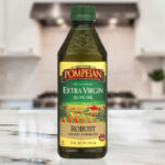 Pompeian Robust Extra Virgin Olive Oil on the Table