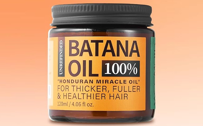 Raw Batana Hair Growth Oil on Orange Background