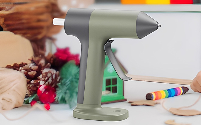 Tilswall 4V Glue Gun in Olive Green Color on the Table