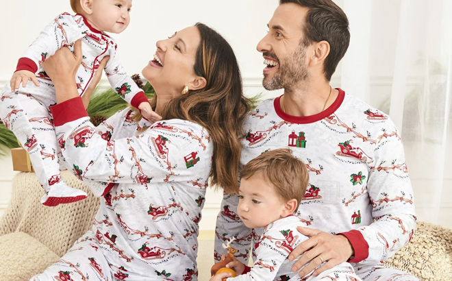 A Family Wearing The Childrens Place Matching Santa Sleigh Cotton Pajamas A Family Wearing The Childrens Place Matching Santa Sleigh Cotton Pajamas